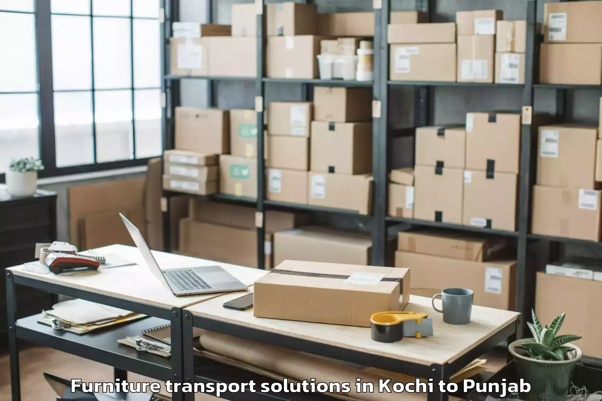 Trusted Kochi to Kartarpur Furniture Transport Solutions